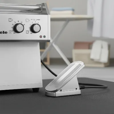 Close-up of Miele Rotary Iron controls with foot pedal and settings